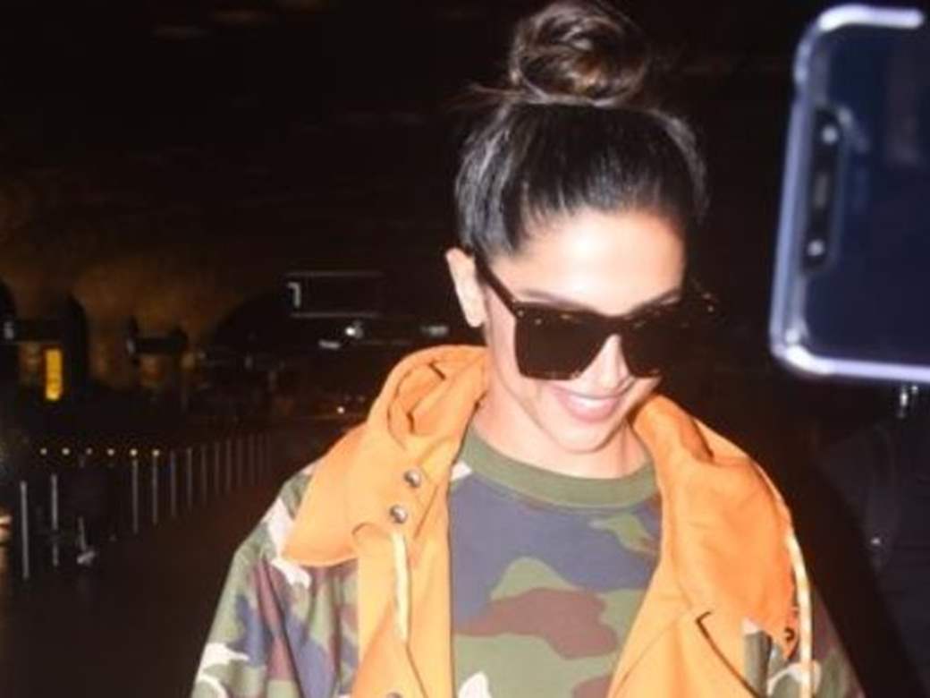 Deepika Padukone's Airport Look Is Complete With A Tan Trench Coat And Her Louis  Vuitton Bag