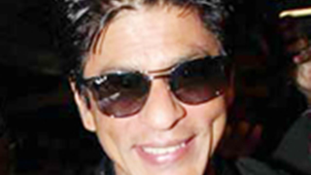 Check out: Shah Rukh Khan gives a glimpse of his tattoo : Bollywood News -  Bollywood Hungama