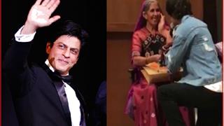 #Video: Shah Rukh woes an old day with his charm, makes her blush!