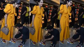 ADORABLE: Anand goes down on his knees to tie Sonam Kapoor's shoelace thumbnail