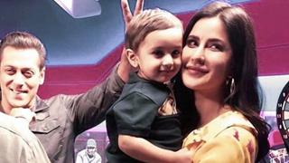 Katrina Kaif is all Smiles as she poses with a Toddler; Salman Khan Photobombs the Picture!
