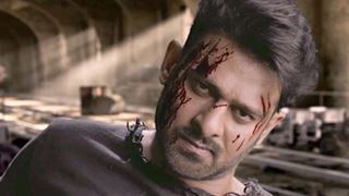 Saaho’s new poster revealed and Prabhas shimmer through it!