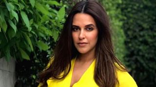 'Freedom to Feed' says Neha Dhupia sharing a picture of breastfeeding her baby boy