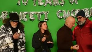 Parineeti completes 10 years in Bollywood; cuts cake with Amitabh Bachchan & Anupam Kher on sets