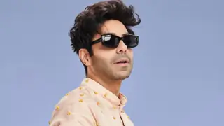 Aparshakti Khurana opens up on experimenting with genres says,”this would be my second time grabbing the guns” Thumbnail