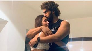 Malaika Arora seals her love as she shares an adorable picture with beau Arjun Kapoor thumbnail