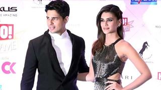 Sidharth Malhotra displays chivalry as he assists Kriti Sanon in lifting her gown