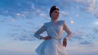 Cannes 2022: Urvashi Rautela dazzles in a pristine white flowy gown