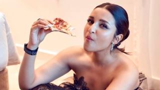Parineeti Chopra stuffs her face with pizza while being decked up for the red carpet