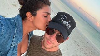 Priyanka Chopra plants a kiss on hubby Nick Jonas as they enjoy their beach vacation