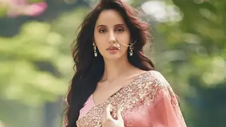 Nora Fatehi joins Karan Johar & Madhuri Dixit to judge 'Jhalak Dikhhla Jaa 10.' thumbnail
