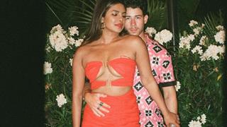 Nick Jonas strikes a stunning pose with his 'lady in red' Priyanka Chopra