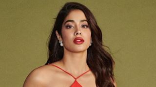 Janhvi Kapoor oozes glam as she sports a deep orange gown - Pics