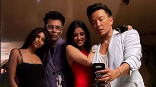 Karan Johar strikes a pose with star kids Suhana and Navya; the trio attends a party with Prabal Gurung