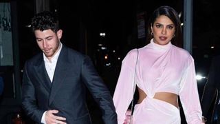 Priyanka Chopra stuns in a white velvet dress roaming hand-in-hand along with hubby Nick - Pics