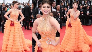 Urvashi Rautela shines at Cannes Film Festival Day 2  in sequined frill orange gown