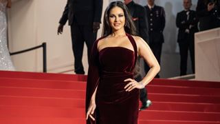 Sunny Leone radiates elegance in a mesmerizing Red velvet gown at Cannes