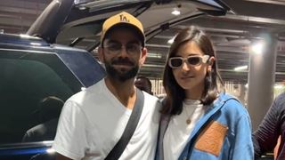 Virat Kohli, Anushka Sharma at the airport; cricketer promises selfie to a fan amid time constraints - Watch