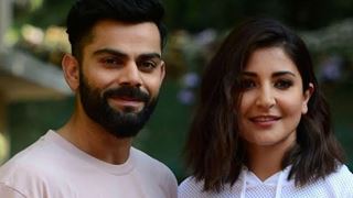  Virat Kohli & Anushka Sharma walking hand-in-hand at a Bengaluru hotel grab eye balls- WATCH