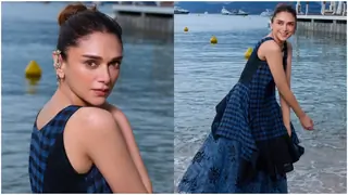 Aditi Rao Hydari ooze glamour at Cannes 2025 in bindi and payal with a sheer shirt amidst a stormy rainy day