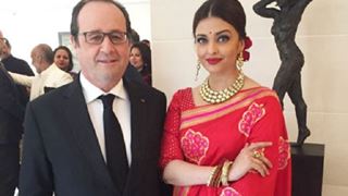 Aishwarya looks ravishing in red sari for Hollande lunch