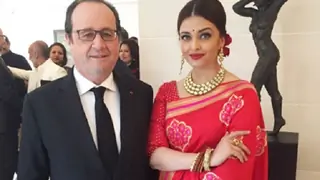 Aishwarya looks ravishing in red sari for Hollande lunch Thumbnail