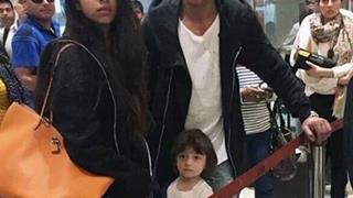 Can you caption this adorable photo of AbRam with SRK & Suhana
