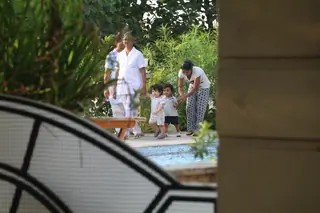 Taimur Ali Khan walking by the poolside Thumbnail