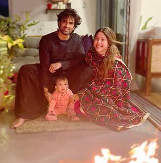 Cute little Ekbir Malik’s first Lohri with parents Mohit and Addite.