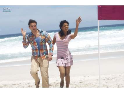 Sohail and Priyanka standing on a beach