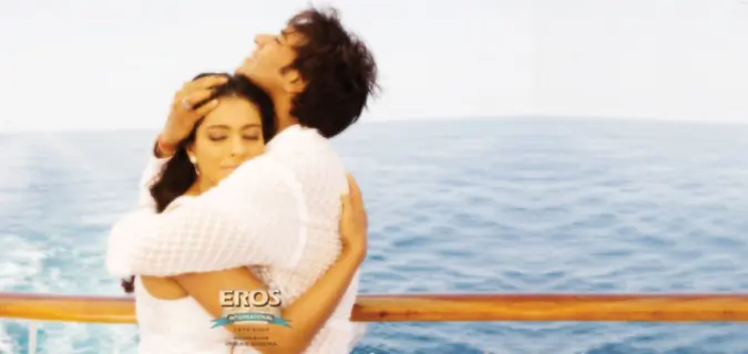 Kajol and Ajay hugging each other