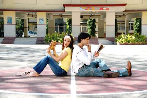 Prashant Chainani and Nauheed Cyrusi reading book