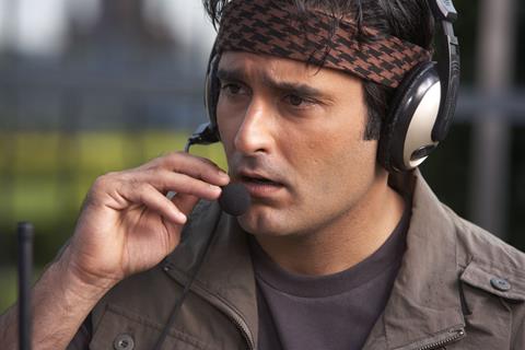 Akshay Khanna talking on a mic in Shortkut