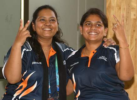 Sayyed Anisa and Sarnobat Rani after winning the Gold in Shooting, Pairs 25 M Pistol Women event at the 19 Commonwealth Games 2010 in New Delhi