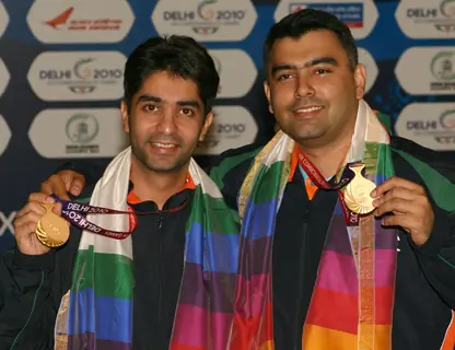 Abhinav Bindra and Gagan Narang after winning the Gold in Shooting Pairs 10 M Air Rifle Men, event at the 19 Commonwealth Games 2010 in New Delhi