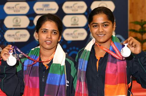 Tejaswini Sawant and Lajjakumari after winning the Siver in Shooting, Pairs 50 M Rifle 3 Positions Women event at the 19 Commonwealth Games 2010 in New Delhi