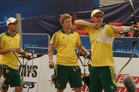 Matthew Gray, Mat Masonwells and Taylor Worth of Australia  in the Men's Team Recurve event at the 19th Commonwealth Games on Friday