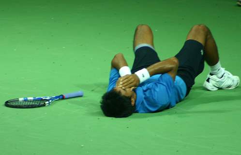 Somdev Devvarman  after winning his final match against Australia's Greg Jones at the 19 th Commonwealth Games,in New Delhi on Sunday