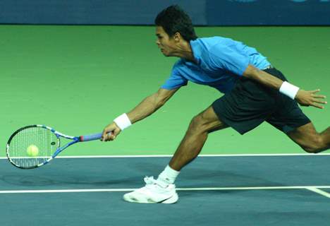 Somdev Devvarman  during his final match against Australia's Greg Jones at the 19 th Commonwealth Games,in New Delhi on Sunday