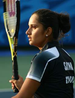 Sania Mirza, paired with Rushmi Chakravarthi, during the women's doubles finals bronze medal match against compatriots Sanjeev Nirupama and Venkatesha Poojashree at the 19 th Commonwealth Games,in New Delhi on Sunday