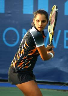 Sania Mirza, paired with Rushmi Chakravarthi, during the women's doubles finals bronze medal match against compatriots Sanjeev Nirupama and Venkatesha Poojashree at the 19 th Commonwealth Games,in New Delhi on Sunday