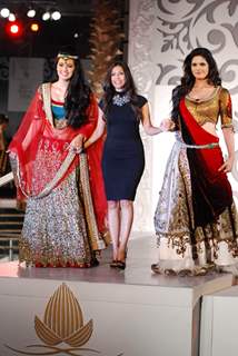 Geeta Basra and Zarine Khan with fashion designer Sonia Mehra walk on ramp at Aamby Valley Indian Br