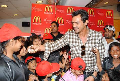 Arjun Rampal & Sajid celebrate Children’s Day with underprivileged kids at McDonalds at Fun Republic in Andheri, Mumbai