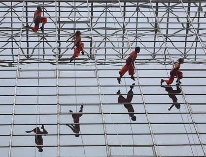 American Dance troupe Project Bandaloop during their aerial dance performance at LIC Building,in New Delhi on Friday