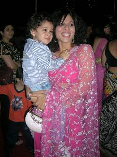 Tanaaz Irani with her new look with her son Zeus in arms