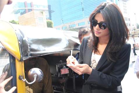 Priyanka Chopra arrives in an auto rickshaw for the 'PEARLS WAVE 2' press conference at Hotel Grand Hyatt in Kalina, Mumbai