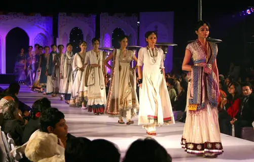 Models showcasing collections by Anju Modi at the National Handloom Expo,in New Delhi on Tuesday. .