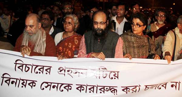 Eminent Tollywood actress Aparna Sen (R) eminent writer Joy Goswami (2nd right) famous social activist Medha Pathekar(2nd Left) and eminet painter Shubhaprasanna (L) takes part in a protest rally to free Dr. Binayak Sen from jail in Kolkata on ...