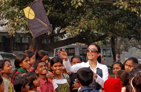 Kolkata: Tollywood actress Paoli Dam celebrates kites festival during the eve of up coming New Year 2011 in kolkata on Friday. .