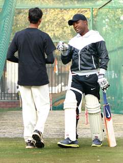 West Indies cricketer Brian Lara gives tips to young cricketers at Ferozshah Kotla  stadium in New Delhi on Tuesday. .